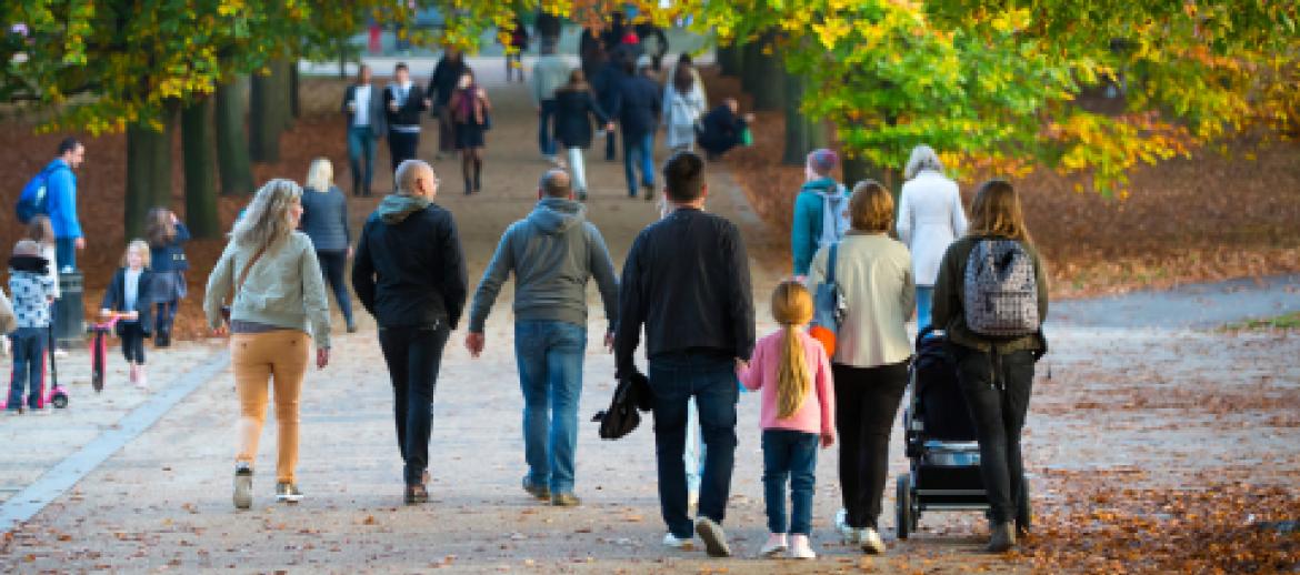 Family walking in holiday park