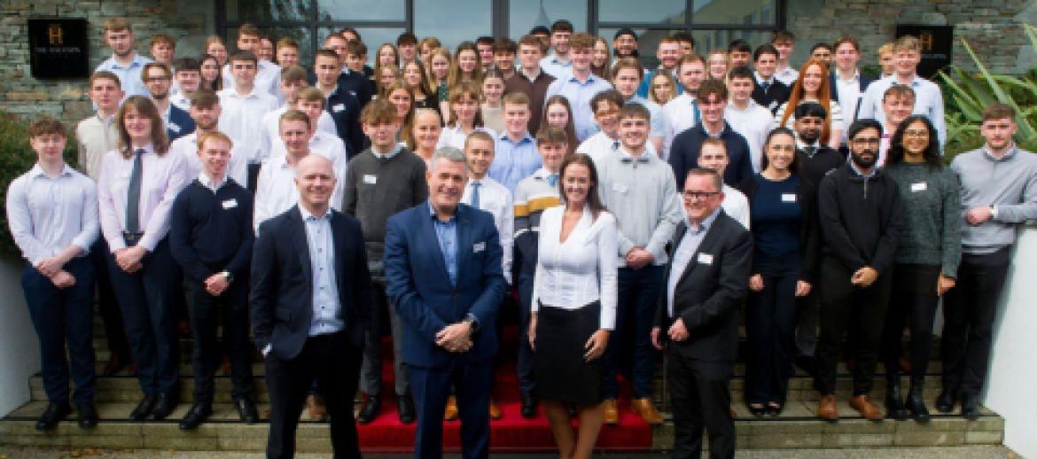 apprentices stood outside