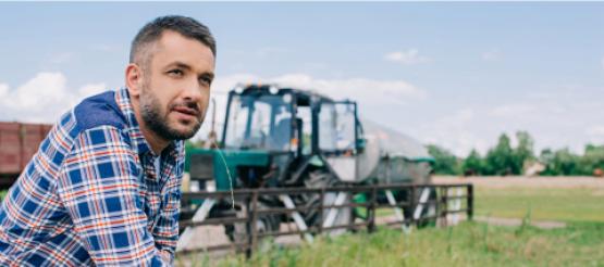 Farming in field with tractor