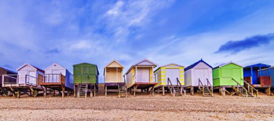 Colourful beach huts in the UK