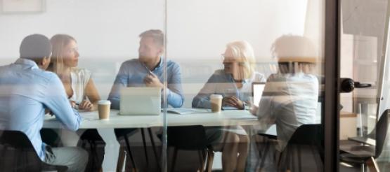 colleagues-in-meeting-room