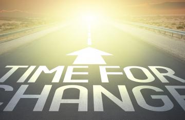 Time for Change on road into the sunset