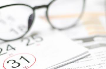 Calendar, glasses and calculator