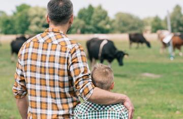 Father and Son on farmland