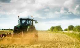 Tractor ploughing on farmland in the UK