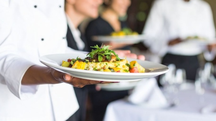 man serving food