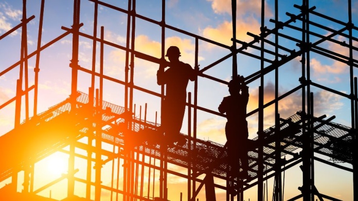 Construction workers on scaffolding