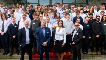 Apprentices stood outside