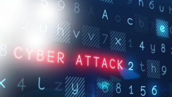 “CYBER ATTACK” highlighted in red against a dark digital code background.