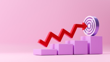 Red upward-trending arrow rising across stepped blocks toward a target, symbolizing business growth, financial performance, and goal achievement.