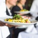 man serving food