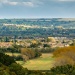 Rural market town nestled among farmland and rolling countryside, illustrating land use and property value.